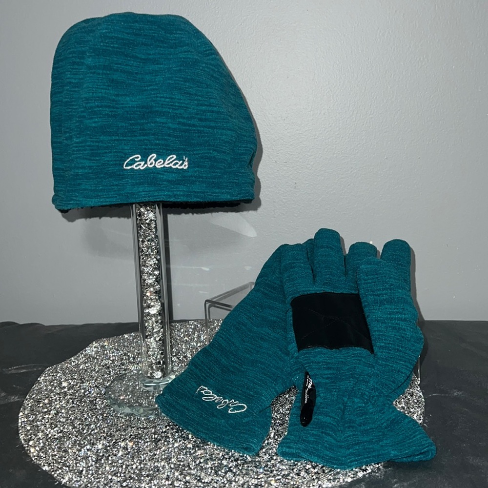 Cabela’s teal hat and gloves set. Hat is one size, gloves are size large.